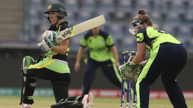 Sweeping the Irish aside: Australia's Elyse Villani hits a boundary in front of Ireland's wicketkeeper Mary Waldron during their World Twenty20 match at the Feroz Shah Kotla Cricket Stadium in New Delhi.