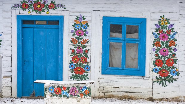 Floral folk decoration on a house in Zalipie, Poland.
