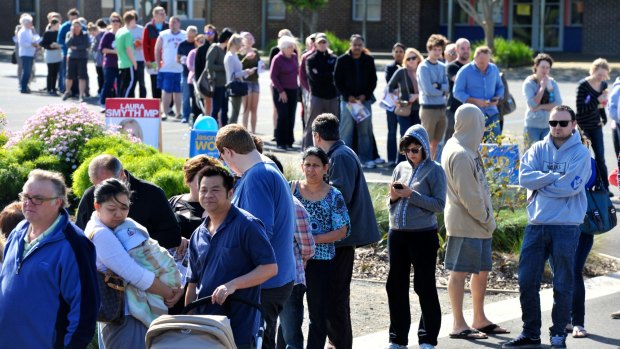 A long line of voters outside a polling place at Timbarra Primary School in Melbourne. 