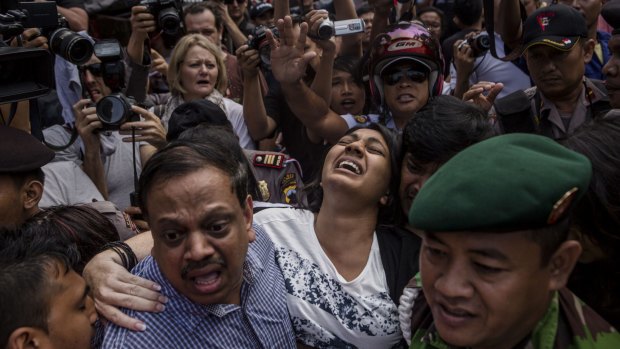 Brintha Sukumaran was in distress as she arrived at Wijaua Pura Port to visit her brother ahead of his and Andrew Chan's executions.