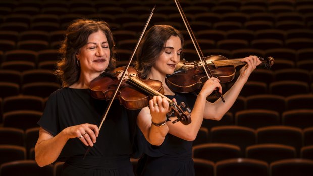 Monique O'Dea (left) has played the viola with the Brandenburg since the orchestra started. Natalia Harvey joined more recently when. Her father, Dominic, was the principal horn with the orchestra.