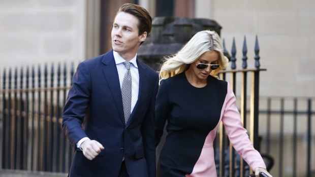 Oliver Curtis and wife Roxy Jacenko arrive at his insider trading trial on Friday.