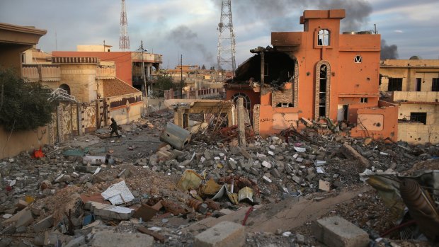 The rubble of a neighbourhood in Sinjar after Kurdish forces took the town.