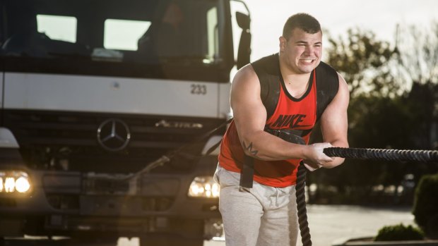 Canberra Strongman Andrew Fraser pulls a truck.