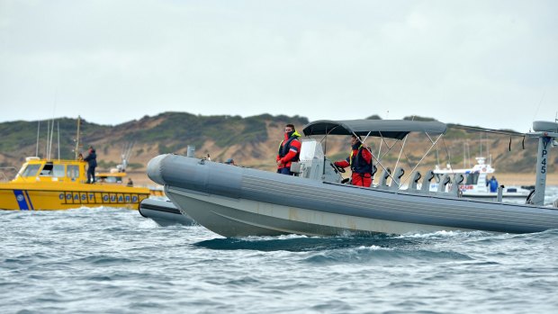 Police and the Coast Guard search for the missing plane crash victim.