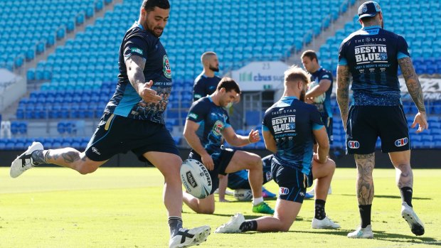 Boots and all: Andrew Fifita goes the toe at Blues training.