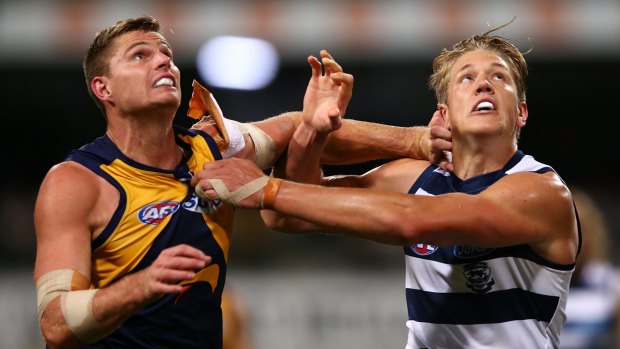 Eagle Nathan Vardy and Rhys Stanley of the Cats contest the ruck on Thursday night.