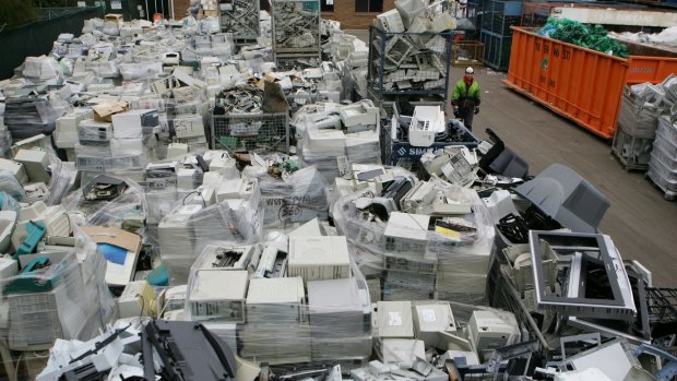 E-waste: Masses of discarded computer and televisions at the recycling plant in Minto.