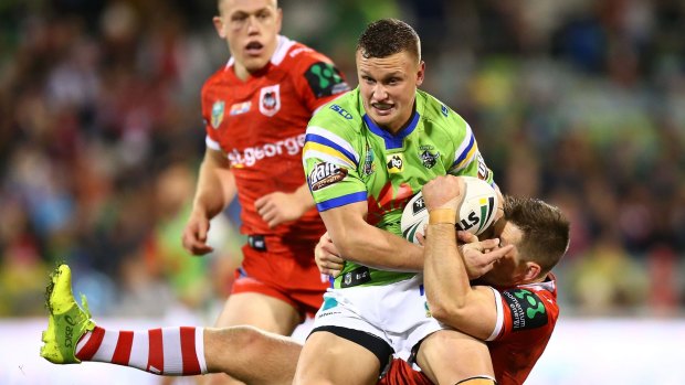 Jack Wighton, of the Raiders, is tackled during match against St George Illawarra Dragons.