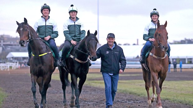 In the blood: Ben Hayes rides out with brothers JD and Will and father David at Flemington.
