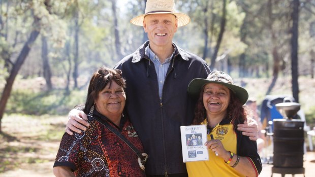 Former environment minister Peter Garrett, who played a large role in the buy back of Marwonga Station, with members of the Ohlsen family.