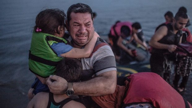 This photo of Syrian refugee Laith Majid and his children struck a chord with thousands around the world.