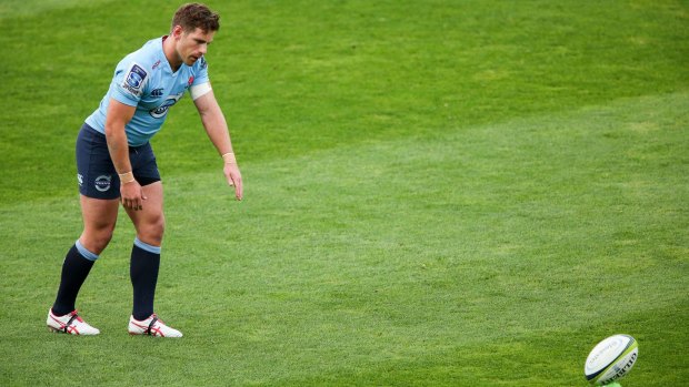 Bernard Foley of the Waratahs lines up a kick during his team's clash with the Hurricanes. 