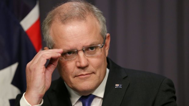Treasurer Scott Morrison addresses the media during a press conference at Parliament House.