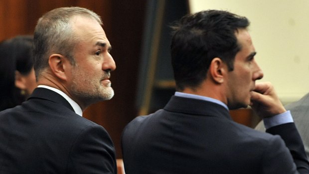 Gawker Media's Nick Denton, left, and  AJ Daulerio, right, listens to testimony during Hulk Hogan's lawsuit trial.