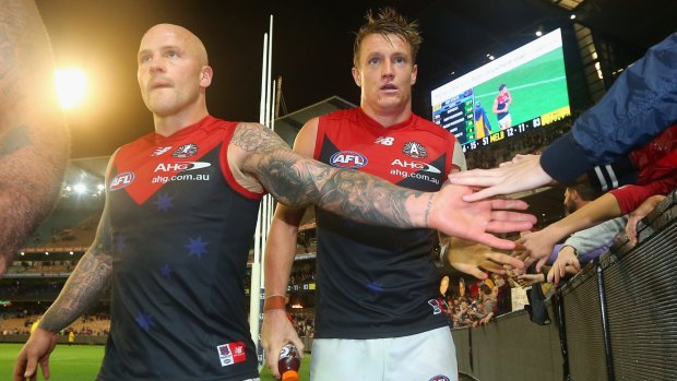 Nathan Jones (left) will lead the Demons again.