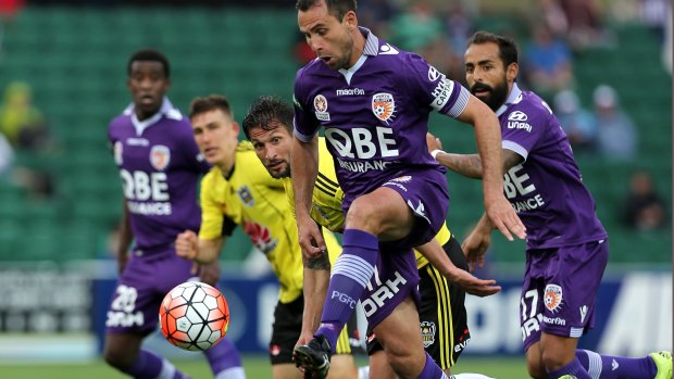 Purple art: Perth Glory's Richard Garcia traps the ball during the round two match against Wellington Phoenix.