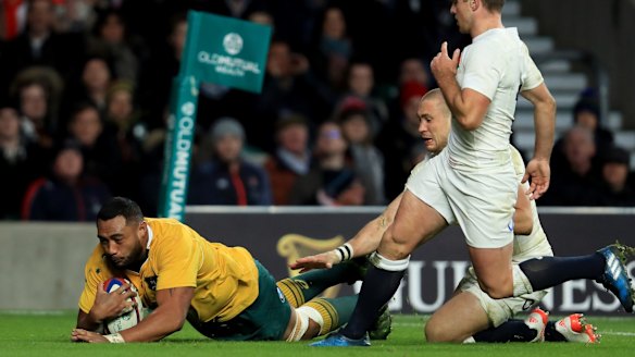 The Wallabies' Sekope Kepu breaks away to score.