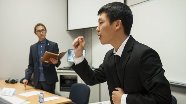 Third International Chinese Debating Competition at the Australian National University between Ian Li from Adelaide University and Jason Angsun (pictured) from ANU.
