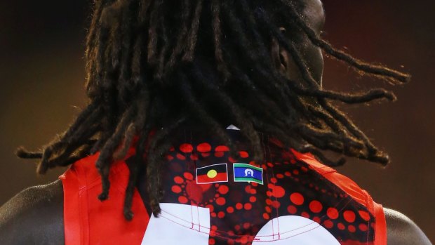 The Indigenous flag colours on the guernsey of Anthony McDonald-Tipungwuti.