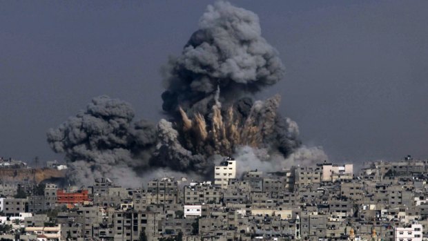 Heavy smoke billows following an Israeli military strike in Gaza City.