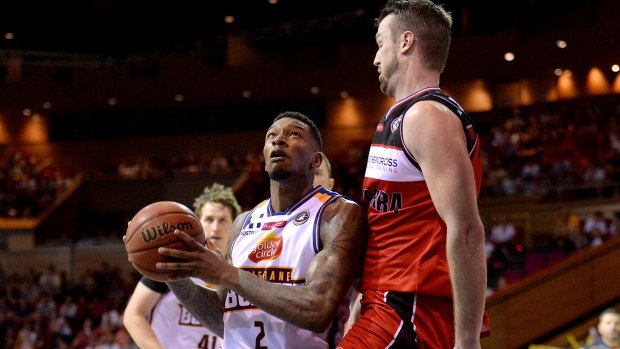 Bullets import Torrey Craig takes on A.J. Ogilvy of the Hawks on Monday night.