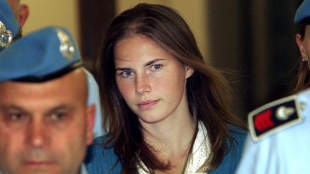 Amanda Knox, escorted by Italian penitentiary police officers to Perugia's court, in 2008.