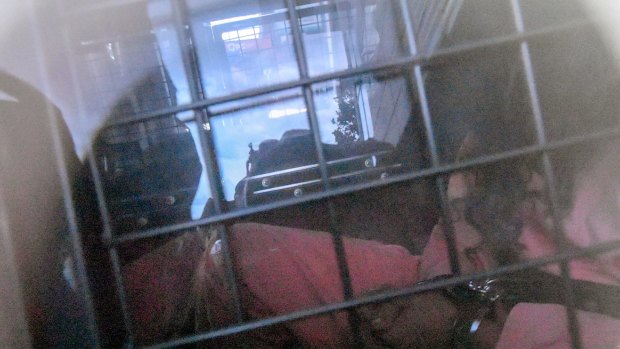 Belal Batka in a prison van after his court appearance on Wednesday. 