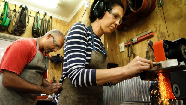 Naresh and Skye Bains taking a knife-making course together at Tharwa Valley Forge. 