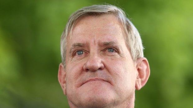 Liberal MP Ian Macfarlane is considering his future following the LNP's rejection of his defection to the Nationals.