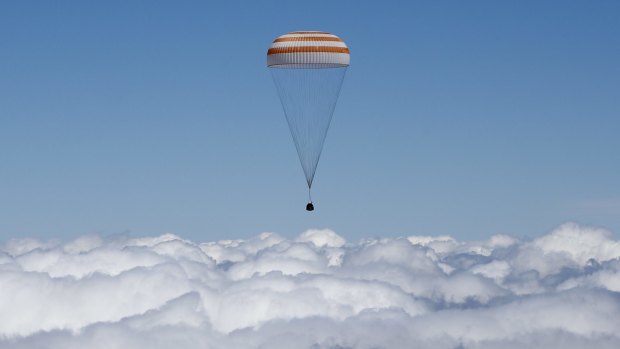 The Soyuz TMA-19M capsule carrying the astronauts back to Earth.