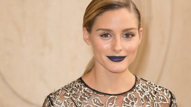 Olivia Palermo attends the Christian Dior show as part of the Paris Fashion Week rocking a chic navy lip.