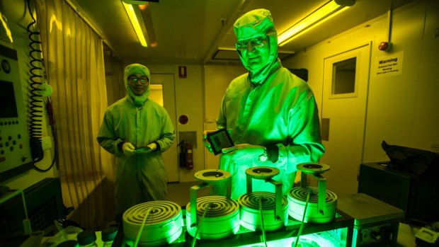 Associate professors Duk Choy and Steve Madden in their ANU laboratory. 