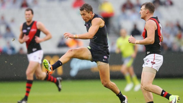Putting the boot in: Carlton's Patrick Cripps.