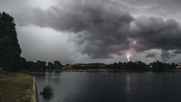 Fisherman braved heavy rain and lightning over Gungahlin in the chase for a big catch.