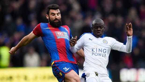 Up against the best: Mile Jedinak in action for Crystal Palace against the table-topping Foxes.