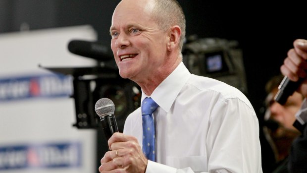 Santa has a special something for Campbell Newman, let's hope it doesn't break on Christmas morning.