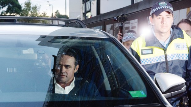 Ben McCormack, charged over child porn offences, leaving Redfern police station on Thursday evening. 