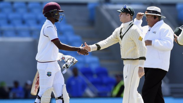 West Indies' opener Kraigg Brathwaite shakes hands with Australian captain Steve Smith after the first Test ended in a resounding defeat for the tourists.