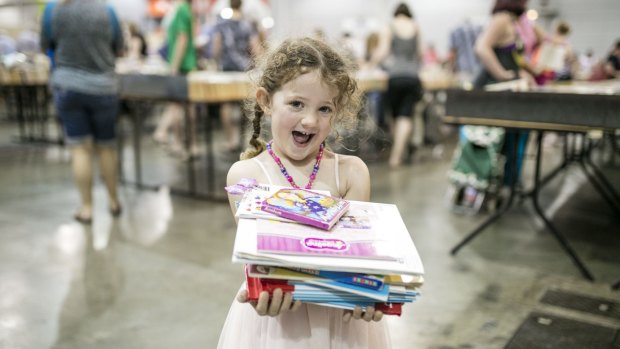 Rory Eggington (4) stocks up at Lifeline Bookfest.