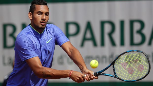 Australia's Nick Kyrgios returns the ball to Germany's Philipp Kohlschreiber during their first round match of the French Open.