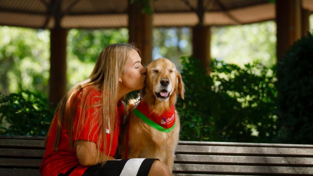 "He brings joy": Delta therapy dogs volunteer Nicci Gradidge with therapy dog Norman. 