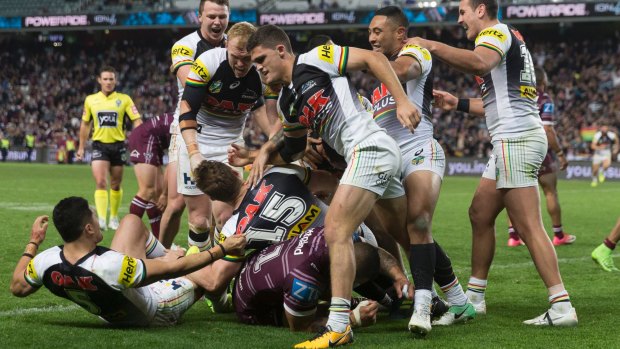 Bryce Cartwright of the Panthers scores the match winner against the Sea Eagles on Saturday.