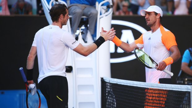 Andy Murray congratulates his conquerer Mischa Zverev.