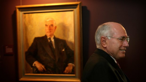 John Howard with Sir Robert Menzies looking over his shoulder.