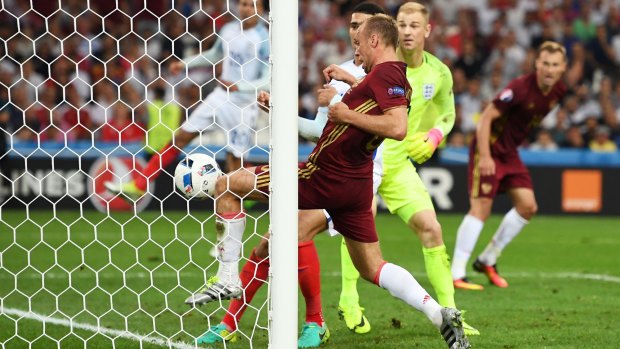 Dramatic: Denis Glushakov scores his team's goal against England.