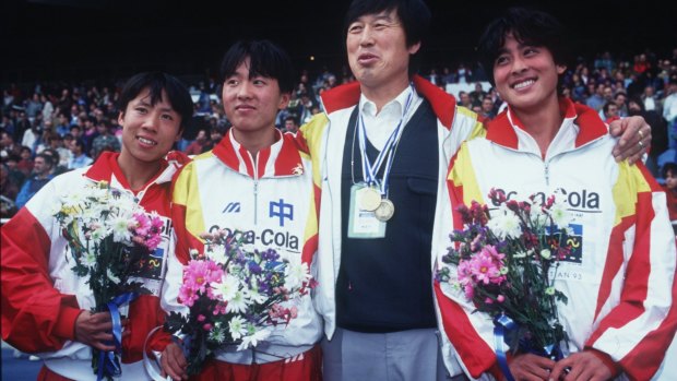 Supercoach Ma Junren, third from left, with Chinese distance athletes in 1993 including Wang Junxia, second from left, Zhang Lirong, left and Zhang Linli, right.  