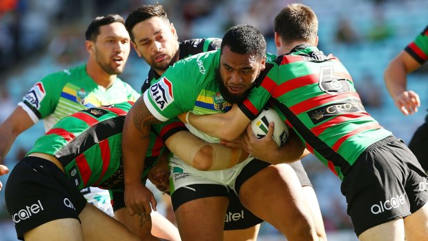 Mid-season acquisition: Ex-Eels prop Junior Paulo is tackled during the round 21 NRL match between the South Sydney Rabbitohs and the Canberra Raiders.