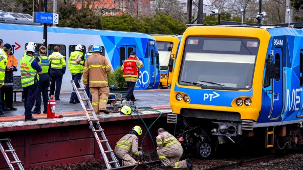 Two elderly women died when a car was hit by a train near Surrey Hills station. 