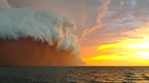 A similarly shaped "red wave" dust storm off the coast of Western Australia in 2013.